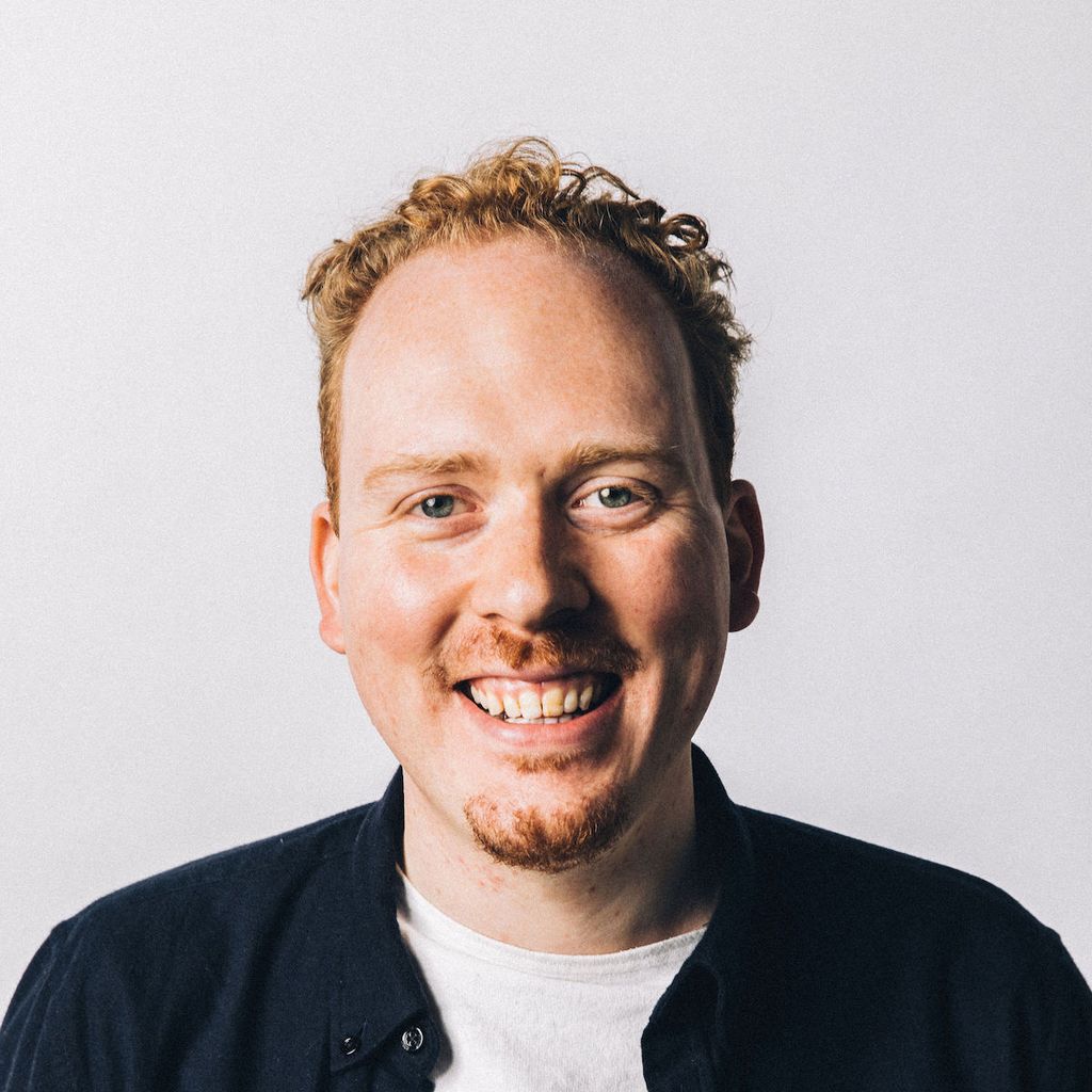 A headshot of Brian J Lange